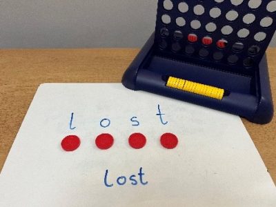 Using Connect 4 counters to practise segmenting